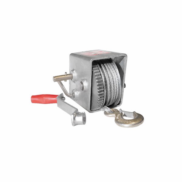 Manual hand winch with a red handle, steel cable, and metal hook, designed for pulling or lifting heavy loads such as boats or trailers.